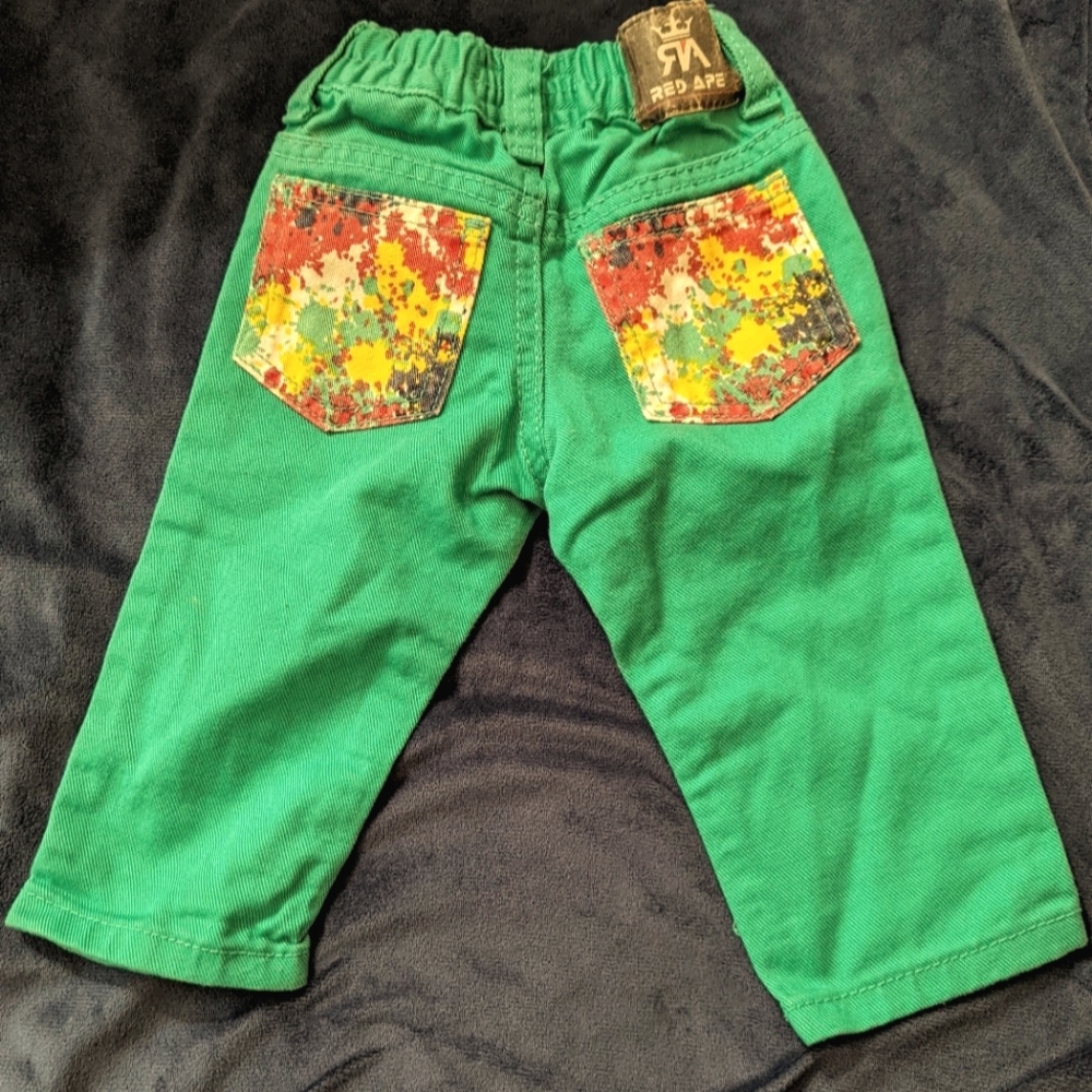 Red Ape Turquoise Jeans w/ colorful pockets size 3-6 months.